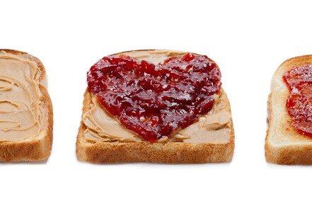 bread toasts with peanut butter spread and jam