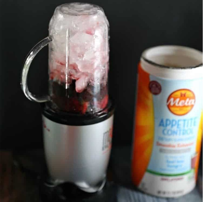 Appetite Control Blackberry Coconut Smoothie + Snacking Tips 11 ice yogurt and blackberries in magic bullet