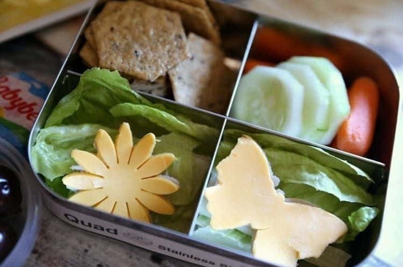 Flowers & Butterfly shaped cheese, cucumbers, baby bell cheese lunchbox