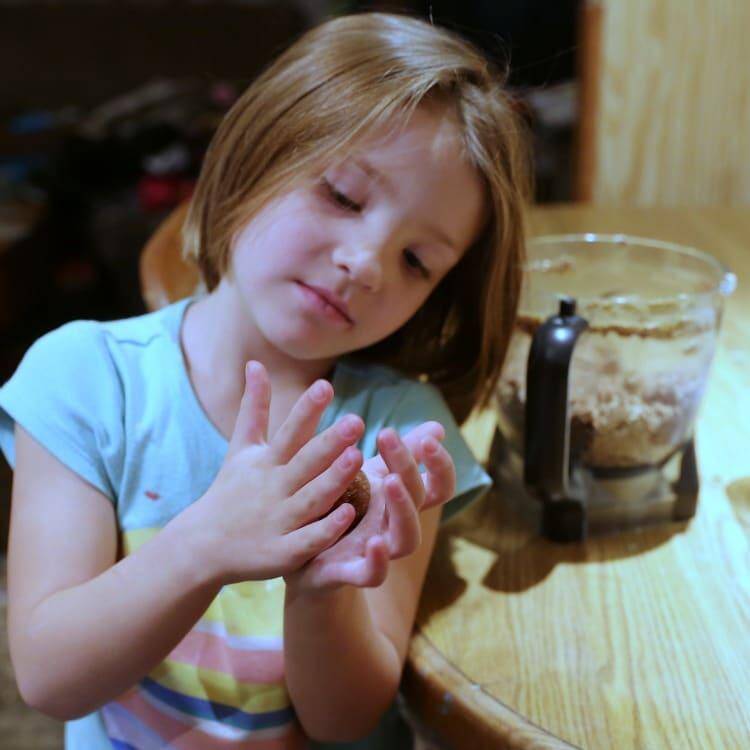 Jennifer brockmans daughter rolling protein balls with hands