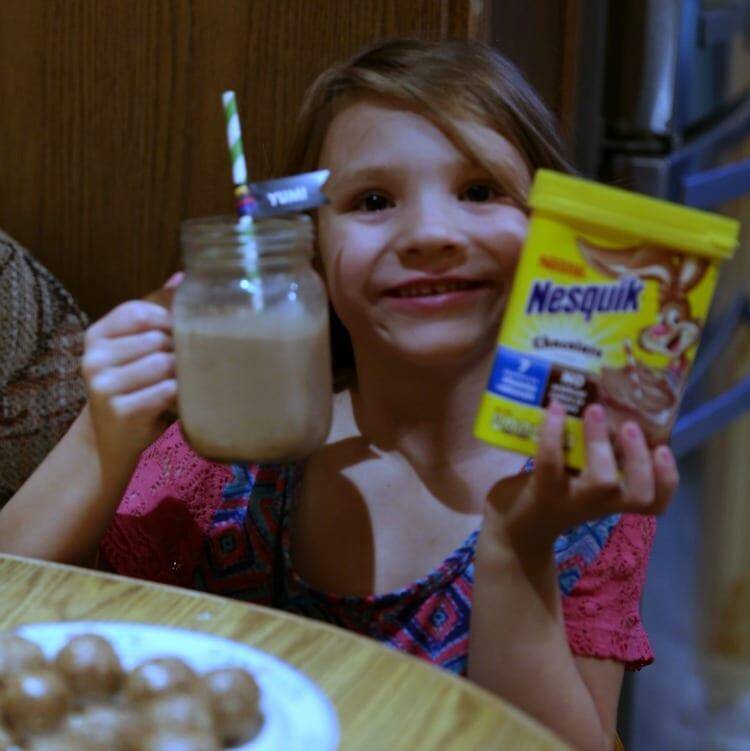 Jennifer brockman's daughter holding chocolate milk