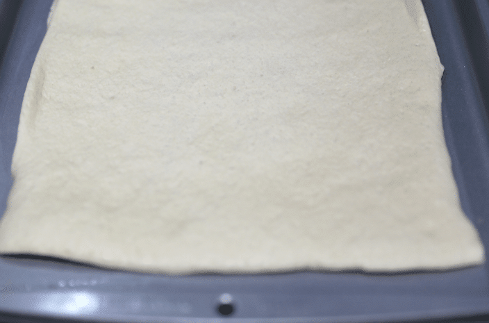unrolled pizza dough