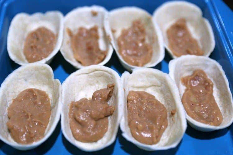 How To Make Delicious Chicken Fajita Taco Boats 14 taco boats with refriend beans