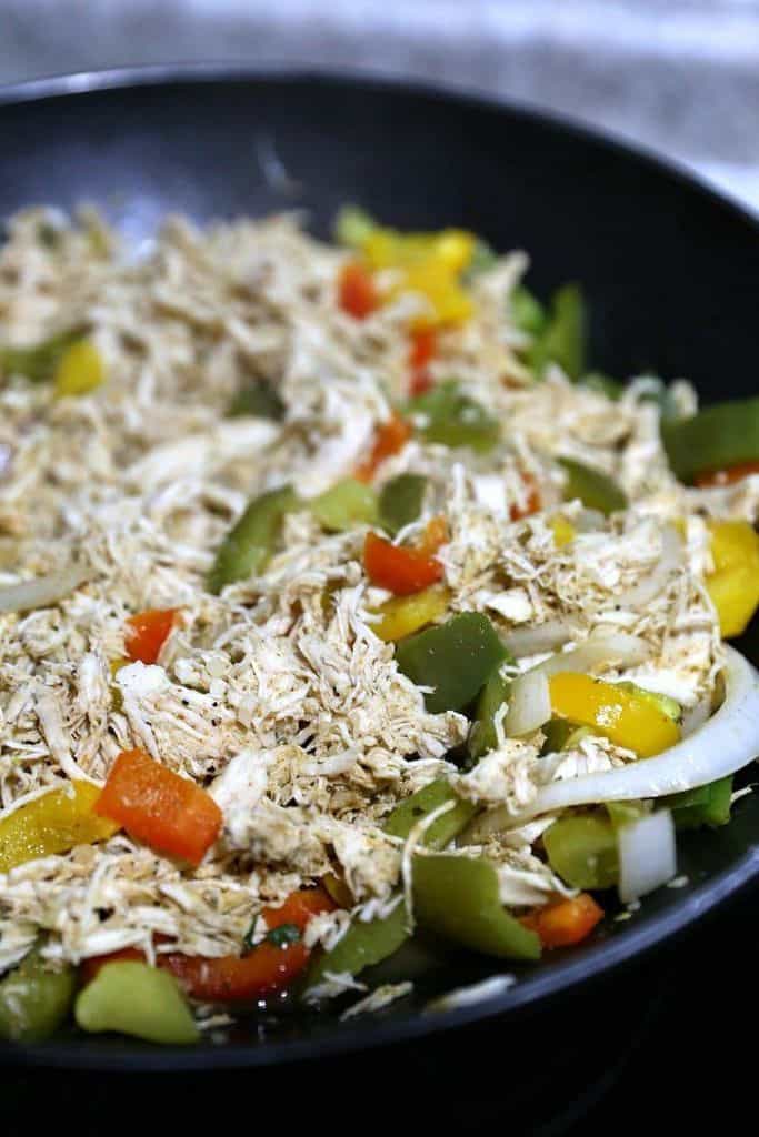 How To Make Delicious Chicken Fajita Taco Boats 13 shredded chicken mixed with colorful peppers