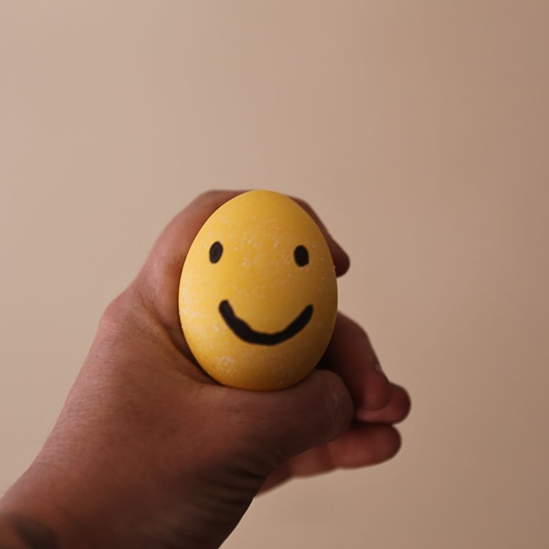 Happy Face Easter Egg colored with food coloring