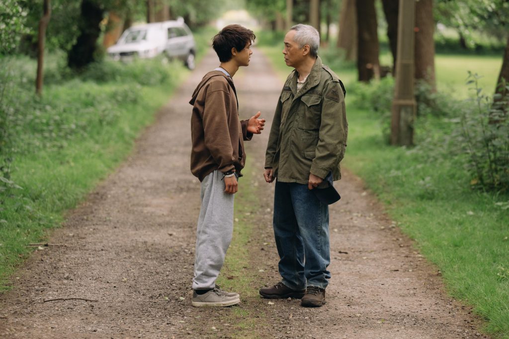John Allen Chau and his father