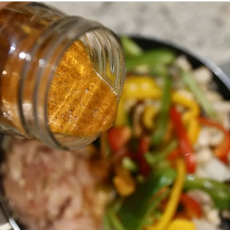 Delicious One Pan Chicken Fajita-ish Wraps: Beat The Diet Tax 15 Adding chicken broth with fajita seasoning to sliced chicken and peppers to cook. Half Baked Media