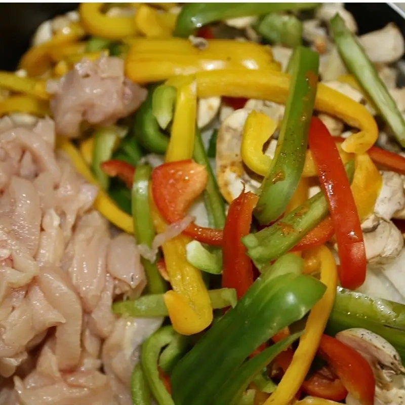 Delicious One Pan Chicken Fajita-ish Wraps: Beat The Diet Tax 14 Fresh ingredients for low calorie chicken fajitas including bell peppers, chicken breast, and Taco Bell seasoning. Half Baked Media